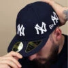 NEW ERA All Over Logo 5950 Low Profile NY